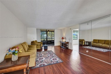 MUST SEE MOVE-IN READY, SPECTACULAR GOLF COURSE VIEWS, 2ND FLOOR on Oriole Golf and Tennis Club in Florida - for sale on GolfHomes.com, golf home, golf lot