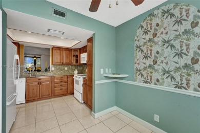 MUST SEE MOVE-IN READY, SPECTACULAR GOLF COURSE VIEWS, 2ND FLOOR on Oriole Golf and Tennis Club in Florida - for sale on GolfHomes.com, golf home, golf lot