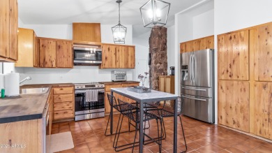 Discover a truly exceptional turnkey home nestled in a quiet on Oakcreek Country Club in Arizona - for sale on GolfHomes.com, golf home, golf lot