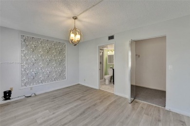 MUST SEE MOVE-IN READY, SPECTACULAR GOLF COURSE VIEWS, 2ND FLOOR on Oriole Golf and Tennis Club in Florida - for sale on GolfHomes.com, golf home, golf lot