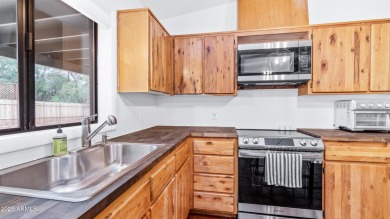 Discover a truly exceptional turnkey home nestled in a quiet on Oakcreek Country Club in Arizona - for sale on GolfHomes.com, golf home, golf lot