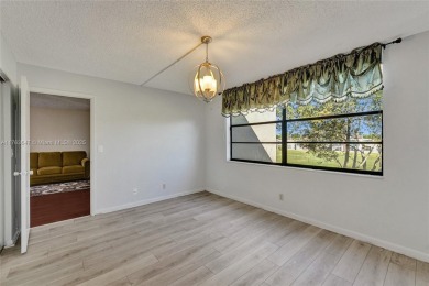 MUST SEE MOVE-IN READY, SPECTACULAR GOLF COURSE VIEWS, 2ND FLOOR on Oriole Golf and Tennis Club in Florida - for sale on GolfHomes.com, golf home, golf lot