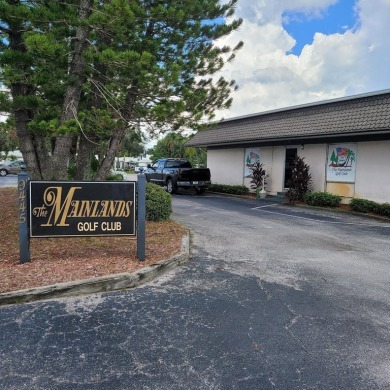Waterfront GEM! This Mainlands home offers 2 bedrooms, 1 on Mainlands Golf Club in Florida - for sale on GolfHomes.com, golf home, golf lot
