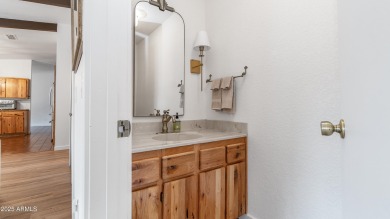 Discover a truly exceptional turnkey home nestled in a quiet on Oakcreek Country Club in Arizona - for sale on GolfHomes.com, golf home, golf lot