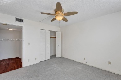 MUST SEE MOVE-IN READY, SPECTACULAR GOLF COURSE VIEWS, 2ND FLOOR on Oriole Golf and Tennis Club in Florida - for sale on GolfHomes.com, golf home, golf lot