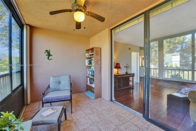 MUST SEE MOVE-IN READY, SPECTACULAR GOLF COURSE VIEWS, 2ND FLOOR on Oriole Golf and Tennis Club in Florida - for sale on GolfHomes.com, golf home, golf lot
