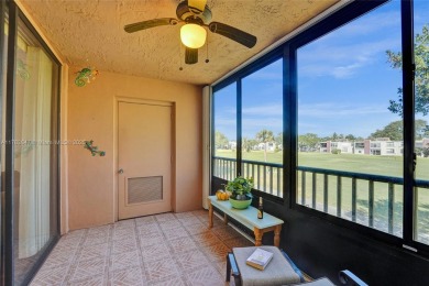 MUST SEE MOVE-IN READY, SPECTACULAR GOLF COURSE VIEWS, 2ND FLOOR on Oriole Golf and Tennis Club in Florida - for sale on GolfHomes.com, golf home, golf lot