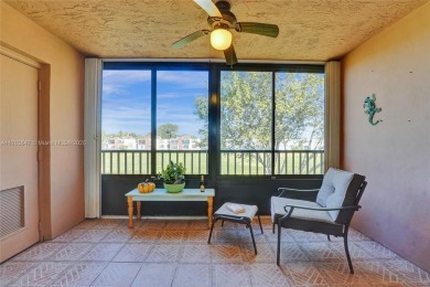 MUST SEE MOVE-IN READY, SPECTACULAR GOLF COURSE VIEWS, 2ND FLOOR on Oriole Golf and Tennis Club in Florida - for sale on GolfHomes.com, golf home, golf lot