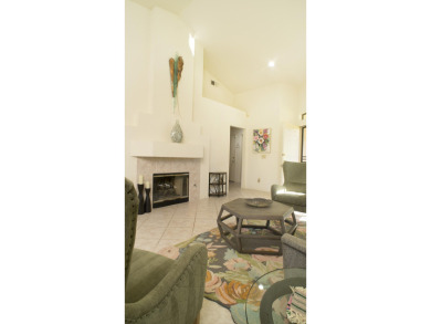 Nestled in the highly sought-after gated community of Palm on Palm Desert Resort Country Club in California - for sale on GolfHomes.com, golf home, golf lot