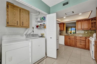 MUST SEE MOVE-IN READY, SPECTACULAR GOLF COURSE VIEWS, 2ND FLOOR on Oriole Golf and Tennis Club in Florida - for sale on GolfHomes.com, golf home, golf lot