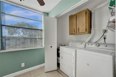 MUST SEE MOVE-IN READY, SPECTACULAR GOLF COURSE VIEWS, 2ND FLOOR on Oriole Golf and Tennis Club in Florida - for sale on GolfHomes.com, golf home, golf lot