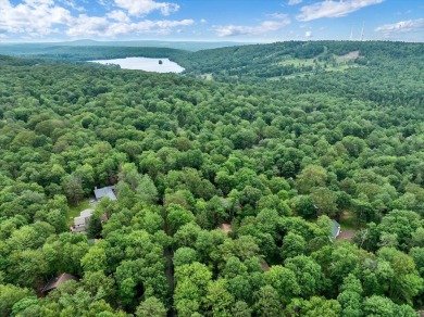 Discover affordable living in sought-after LAKE HARMONY ESTATES! on Split Rock Resort and Country Club in Pennsylvania - for sale on GolfHomes.com, golf home, golf lot