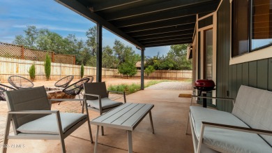 Discover a truly exceptional turnkey home nestled in a quiet on Oakcreek Country Club in Arizona - for sale on GolfHomes.com, golf home, golf lot