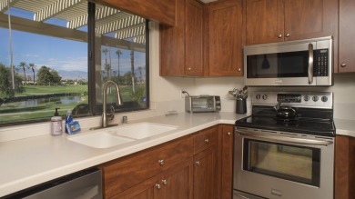 Nestled in the highly sought-after gated community of Palm on Palm Desert Resort Country Club in California - for sale on GolfHomes.com, golf home, golf lot