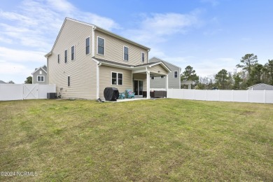 Step into this inviting move-in ready home quietly nestled in on Lennon Hills Golf Course in North Carolina - for sale on GolfHomes.com, golf home, golf lot