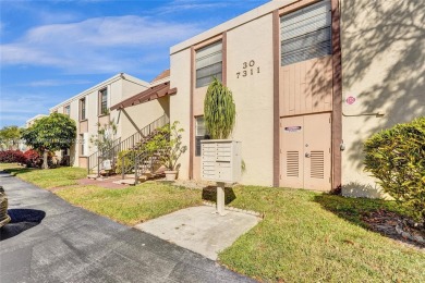 MUST SEE MOVE-IN READY, SPECTACULAR GOLF COURSE VIEWS, 2ND FLOOR on Oriole Golf and Tennis Club in Florida - for sale on GolfHomes.com, golf home, golf lot