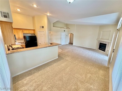 GOLF, LAKE & MOUNTAIN VIEWS! MOVE-IN READY UPSTAIRS CORNER UNIT on Painted Desert Golf Club in Nevada - for sale on GolfHomes.com, golf home, golf lot