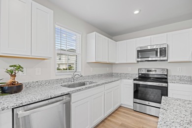 Welcome to this stunning 3-bedroom, 2.5-bath end-unit on Arrowhead Country Club in South Carolina - for sale on GolfHomes.com, golf home, golf lot