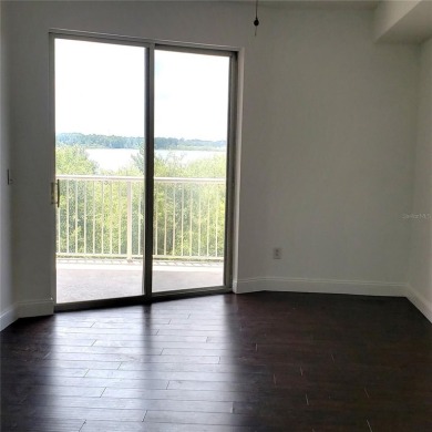 Spacious 3-Bedroom, 2-Bath Condo with Lake View - Prime Orlando on MetroWest Golf Club in Florida - for sale on GolfHomes.com, golf home, golf lot