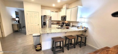 Come see this incredible single story attached home with high on Walkabout Golf and Country Club in Florida - for sale on GolfHomes.com, golf home, golf lot