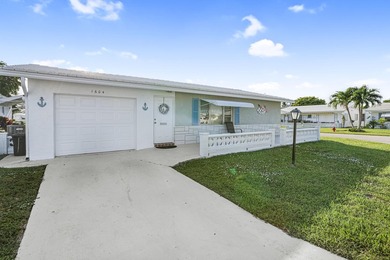 Welcome to this beautifully maintained 2-bedroom, 2-bath on Leisureville Community Golf Course in Florida - for sale on GolfHomes.com, golf home, golf lot