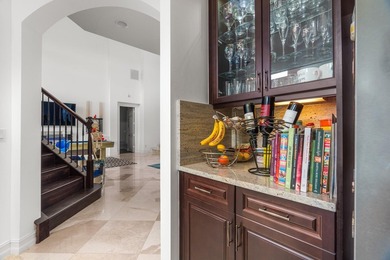 Step onto this stunning contemporary 5B/4Full BA/3 car gar on PGA National Estates Golf Course in Florida - for sale on GolfHomes.com, golf home, golf lot