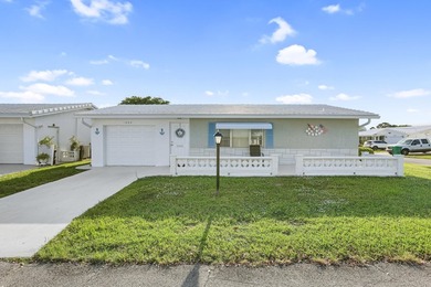 Welcome to this beautifully maintained 2-bedroom, 2-bath on Leisureville Community Golf Course in Florida - for sale on GolfHomes.com, golf home, golf lot