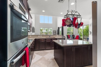 Step onto this stunning contemporary 5B/4Full BA/3 car gar on PGA National Estates Golf Course in Florida - for sale on GolfHomes.com, golf home, golf lot