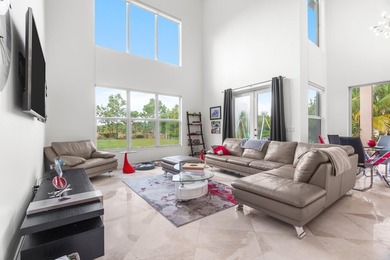 Step onto this stunning contemporary 5B/4Full BA/3 car gar on PGA National Estates Golf Course in Florida - for sale on GolfHomes.com, golf home, golf lot
