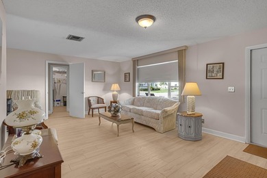 Welcome to this beautifully maintained 2-bedroom, 2-bath on Leisureville Community Golf Course in Florida - for sale on GolfHomes.com, golf home, golf lot