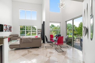Step onto this stunning contemporary 5B/4Full BA/3 car gar on PGA National Estates Golf Course in Florida - for sale on GolfHomes.com, golf home, golf lot