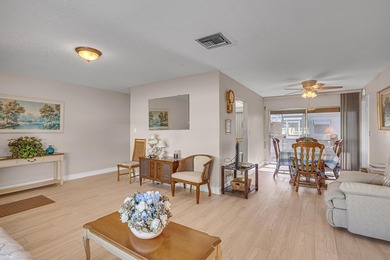 Welcome to this beautifully maintained 2-bedroom, 2-bath on Leisureville Community Golf Course in Florida - for sale on GolfHomes.com, golf home, golf lot