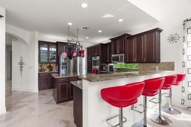 Step onto this stunning contemporary 5B/4Full BA/3 car gar on PGA National Estates Golf Course in Florida - for sale on GolfHomes.com, golf home, golf lot