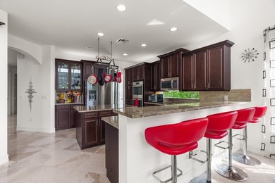 Step onto this stunning contemporary 5B/4Full BA/3 car gar on PGA National Estates Golf Course in Florida - for sale on GolfHomes.com, golf home, golf lot