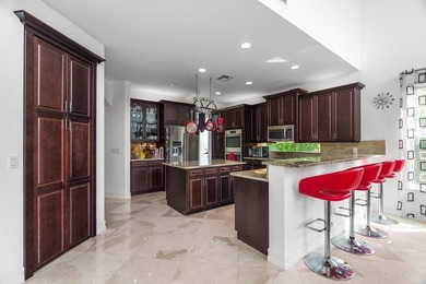 Step onto this stunning contemporary 5B/4Full BA/3 car gar on PGA National Estates Golf Course in Florida - for sale on GolfHomes.com, golf home, golf lot