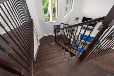 Step onto this stunning contemporary 5B/4Full BA/3 car gar on PGA National Estates Golf Course in Florida - for sale on GolfHomes.com, golf home, golf lot