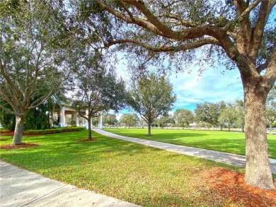 Enjoy expansive Heritage Park views from the front porch of this on The Club At Pointe West in Florida - for sale on GolfHomes.com, golf home, golf lot
