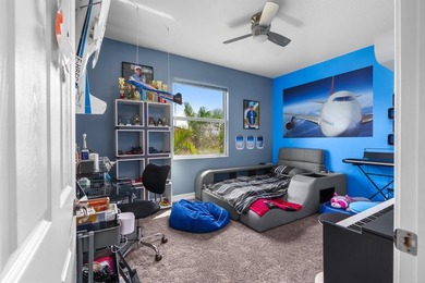 Step onto this stunning contemporary 5B/4Full BA/3 car gar on PGA National Estates Golf Course in Florida - for sale on GolfHomes.com, golf home, golf lot