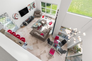 Step onto this stunning contemporary 5B/4Full BA/3 car gar on PGA National Estates Golf Course in Florida - for sale on GolfHomes.com, golf home, golf lot