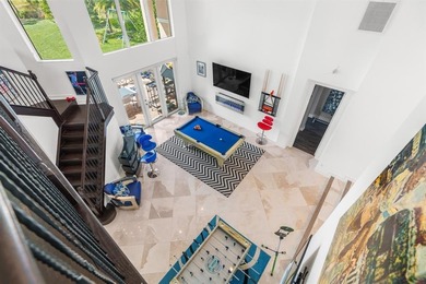 Step onto this stunning contemporary 5B/4Full BA/3 car gar on PGA National Estates Golf Course in Florida - for sale on GolfHomes.com, golf home, golf lot