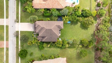 Step onto this stunning contemporary 5B/4Full BA/3 car gar on PGA National Estates Golf Course in Florida - for sale on GolfHomes.com, golf home, golf lot