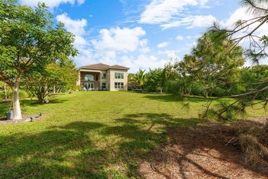 Step onto this stunning contemporary 5B/4Full BA/3 car gar on PGA National Estates Golf Course in Florida - for sale on GolfHomes.com, golf home, golf lot