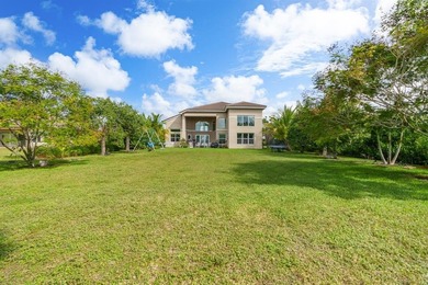 Step onto this stunning contemporary 5B/4Full BA/3 car gar on PGA National Estates Golf Course in Florida - for sale on GolfHomes.com, golf home, golf lot
