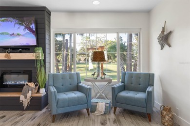 Step inside and exhale--from morning coffee by the pool to on Palm Harbor Golf Club in Florida - for sale on GolfHomes.com, golf home, golf lot