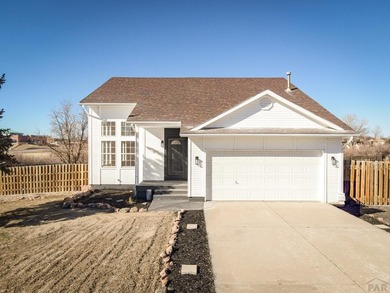 This spacious 2-story home offers 2,354 sq ft with 5 bedrooms, 3 on Desert Hawk At Pueblo West in Colorado - for sale on GolfHomes.com, golf home, golf lot