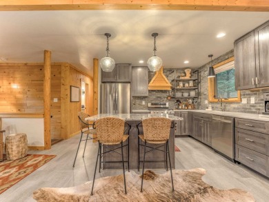 Just a stone's throw from Monte Verde Lake, this fully remodeled on Angel Fire Resort Country Club in New Mexico - for sale on GolfHomes.com, golf home, golf lot