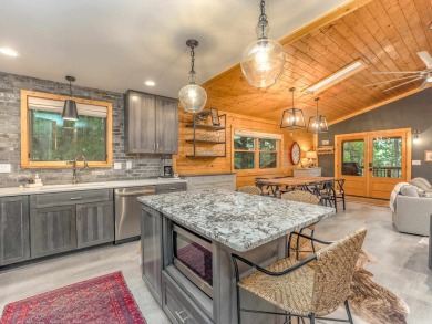 Just a stone's throw from Monte Verde Lake, this fully remodeled on Angel Fire Resort Country Club in New Mexico - for sale on GolfHomes.com, golf home, golf lot