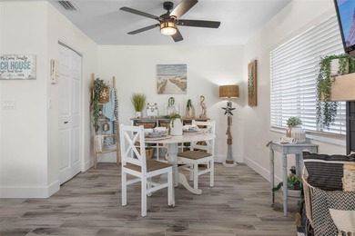 Step inside and exhale--from morning coffee by the pool to on Palm Harbor Golf Club in Florida - for sale on GolfHomes.com, golf home, golf lot