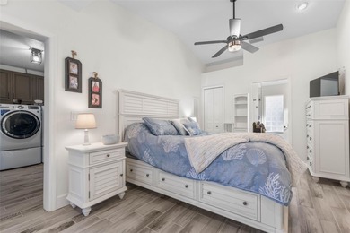 Step inside and exhale--from morning coffee by the pool to on Palm Harbor Golf Club in Florida - for sale on GolfHomes.com, golf home, golf lot