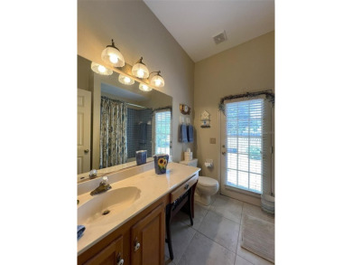 A NEW REDUCED LIST PRICE.  A gorgeous custom 5 bedroom 3 full on Temple Terrace Golf and Country Club in Florida - for sale on GolfHomes.com, golf home, golf lot